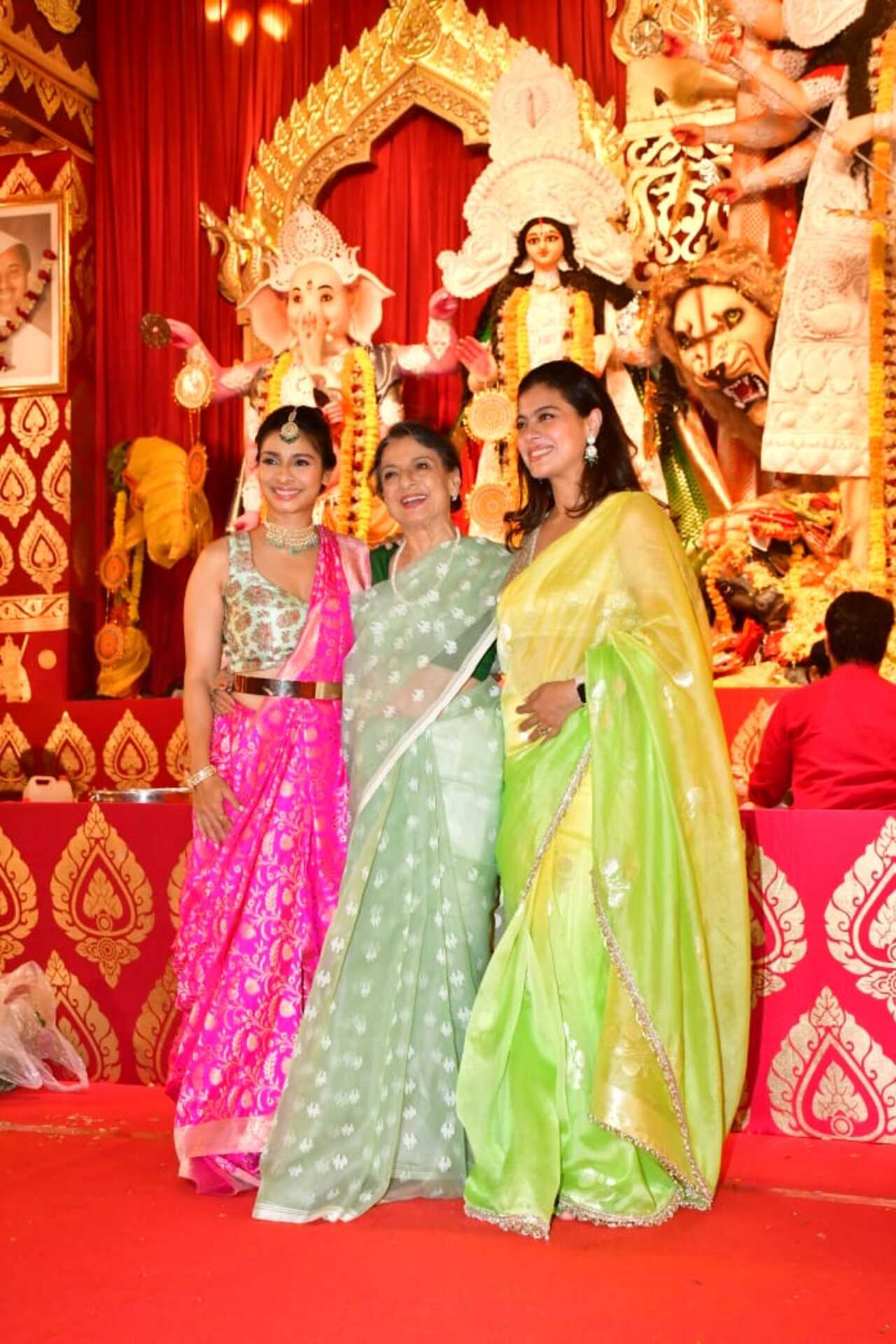 Kajol wore a dual-toned yellow and green saree whereas her younger sister was dressed in a pink saree