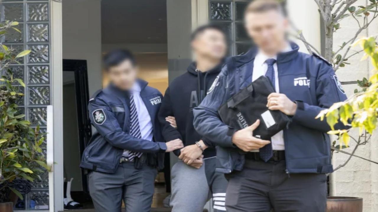 Australian police charge 7 with laundering hundreds of millions for Chinese crime syndicate