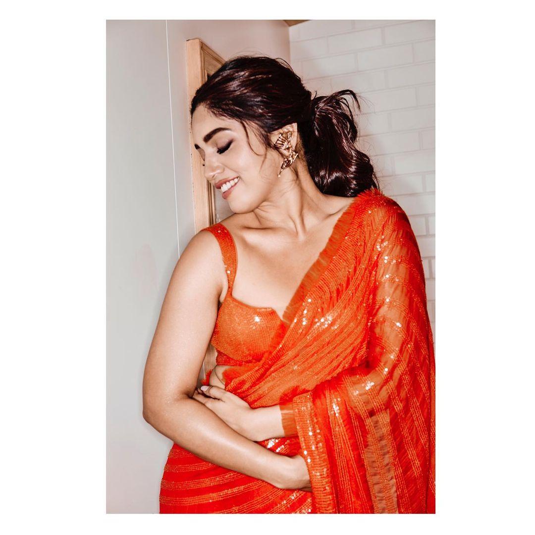 Bhumi Pednekar looked absolutely stunning in a vibrant, orange sequined saree that caught everyone's attention. 