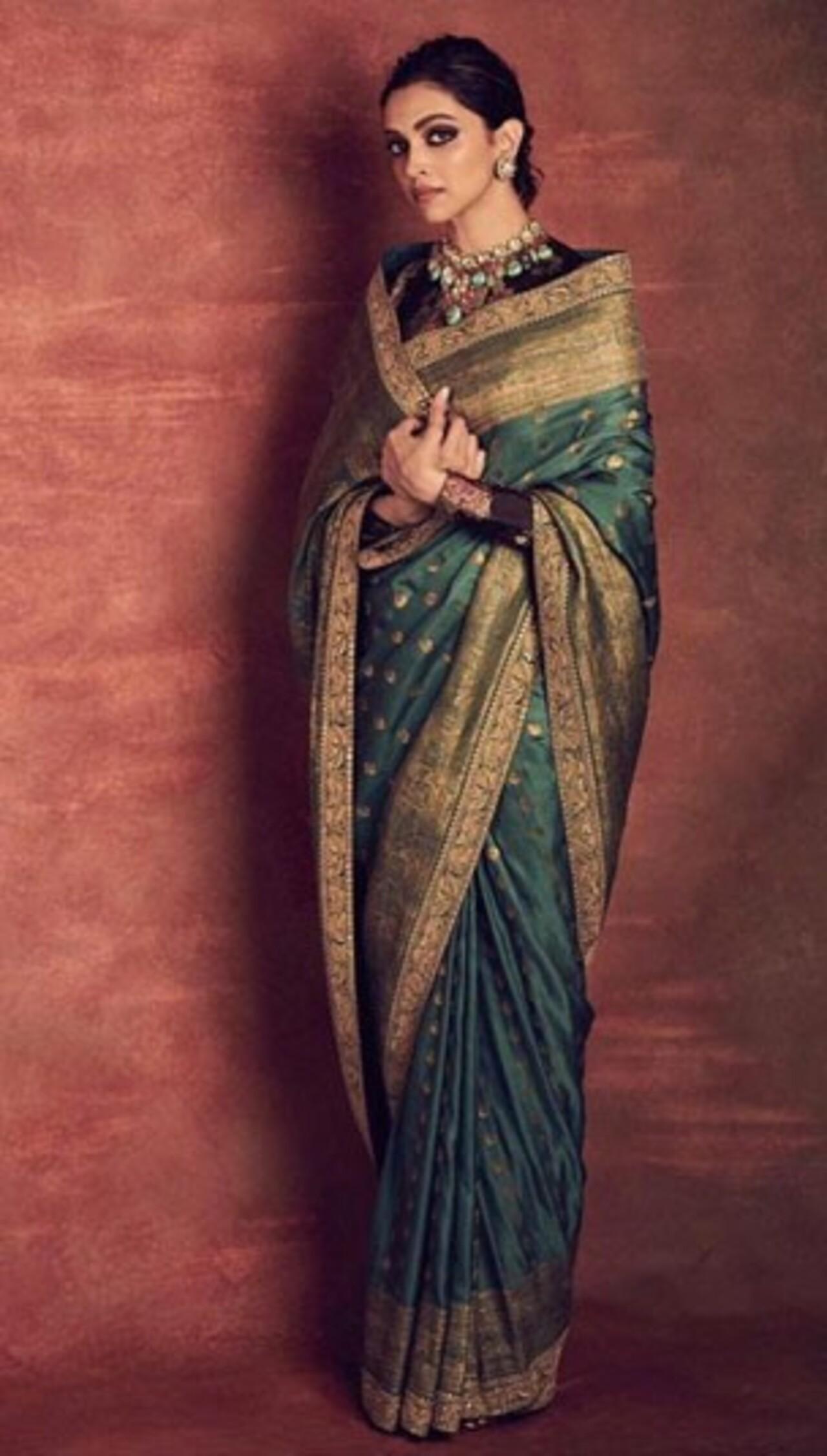 Day 8 (Peacock): Deepika Padukone's affair with saree is our favourite. Wearing yet another beautiful piece, she was dressed elegantly