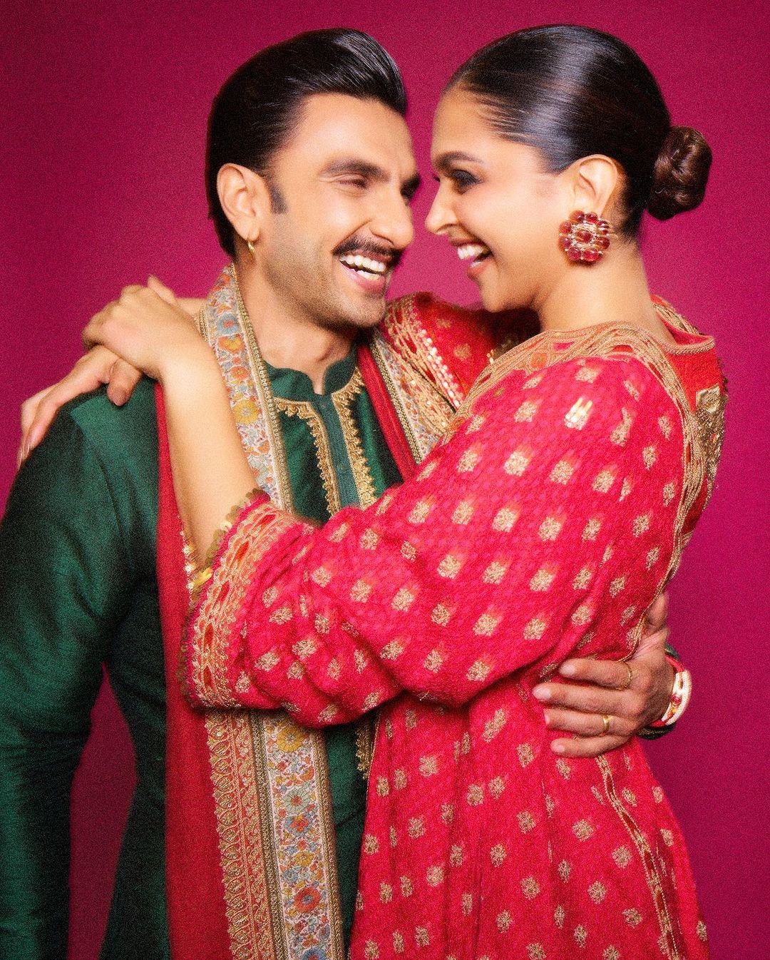Deepika Padukone, ever the fashion diva, chose a crimson red kurta by  Sabyasachi Mukherjee. The golden embroidery, intricate threadwork, and statement V-neckline added an air of opulence to her ensemble. Ranveer Singh's dark green kurta adorned with golden embroidery. His matching churidar added an extra layer of sophistication to his look, proving once again the couple is the ultimate showstopper, even during festive occasions.