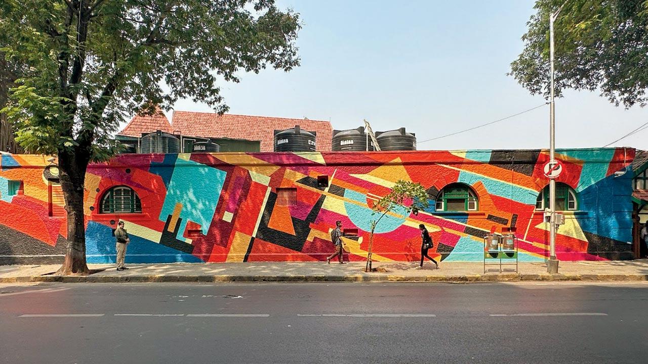 The mural on the wall of the Bombay Gymkhana