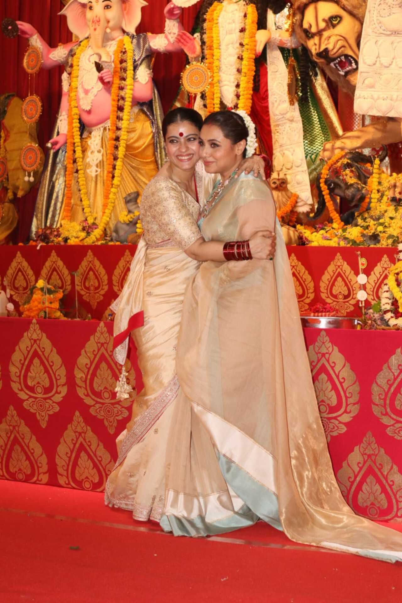 Rani and Kajol hugged each other while posing for pictures