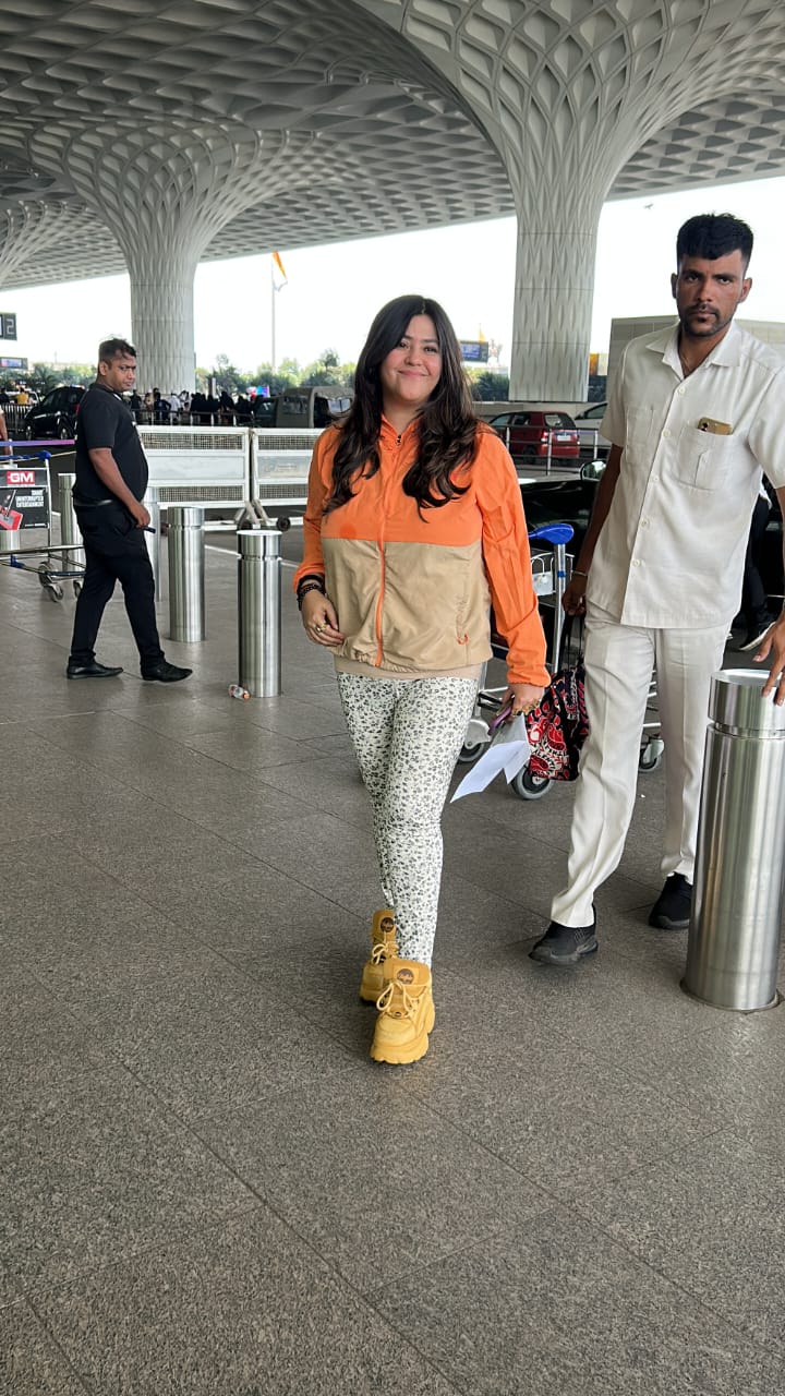 Ekta Kapoor looked stunning as she opted for printed pajamas and an orange-brown jacket paired with yellow sneakers