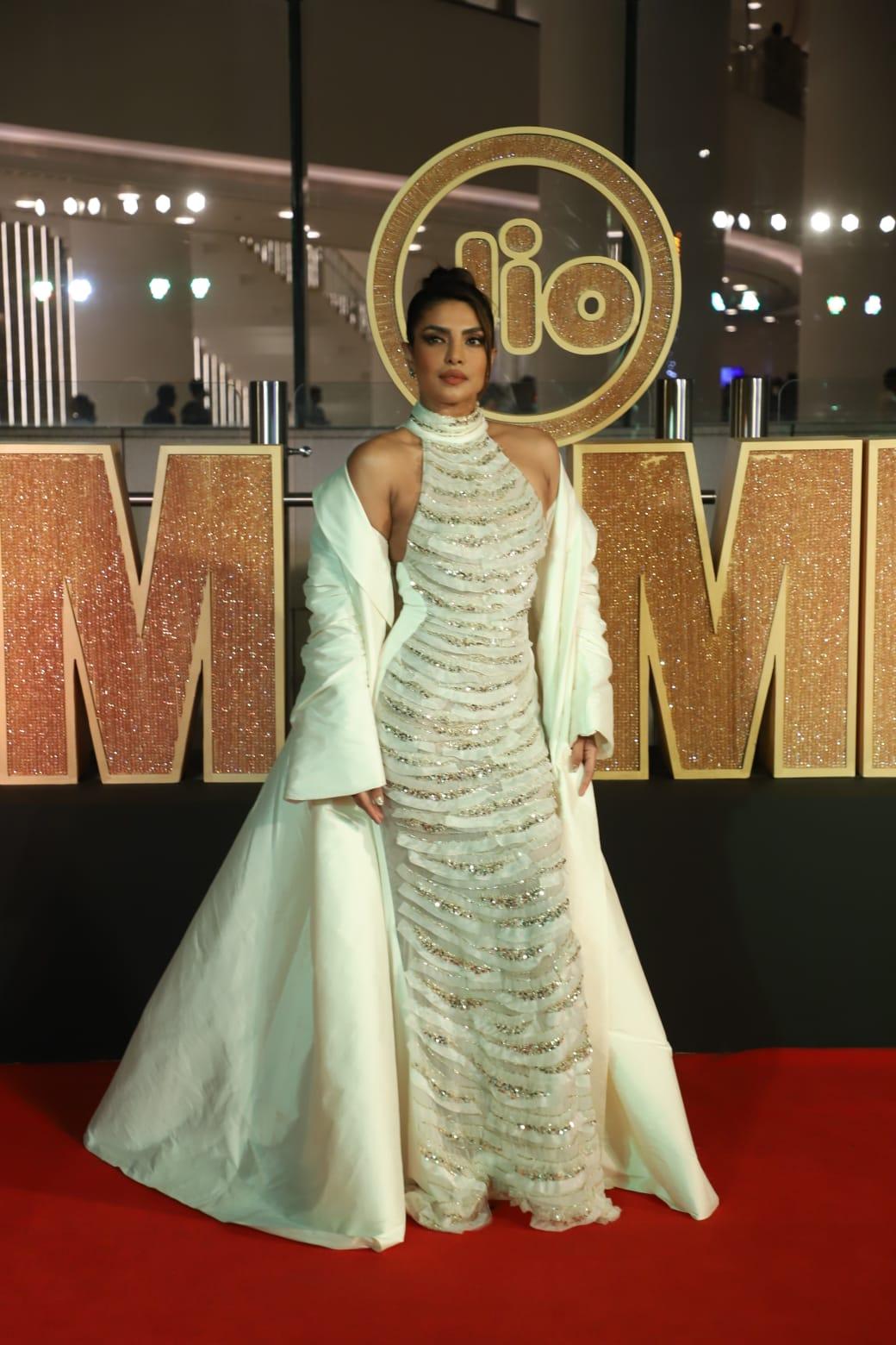 Priyanka Chopra flew to India to attend the Jio MAMI event. The actress donned a pristine white dress