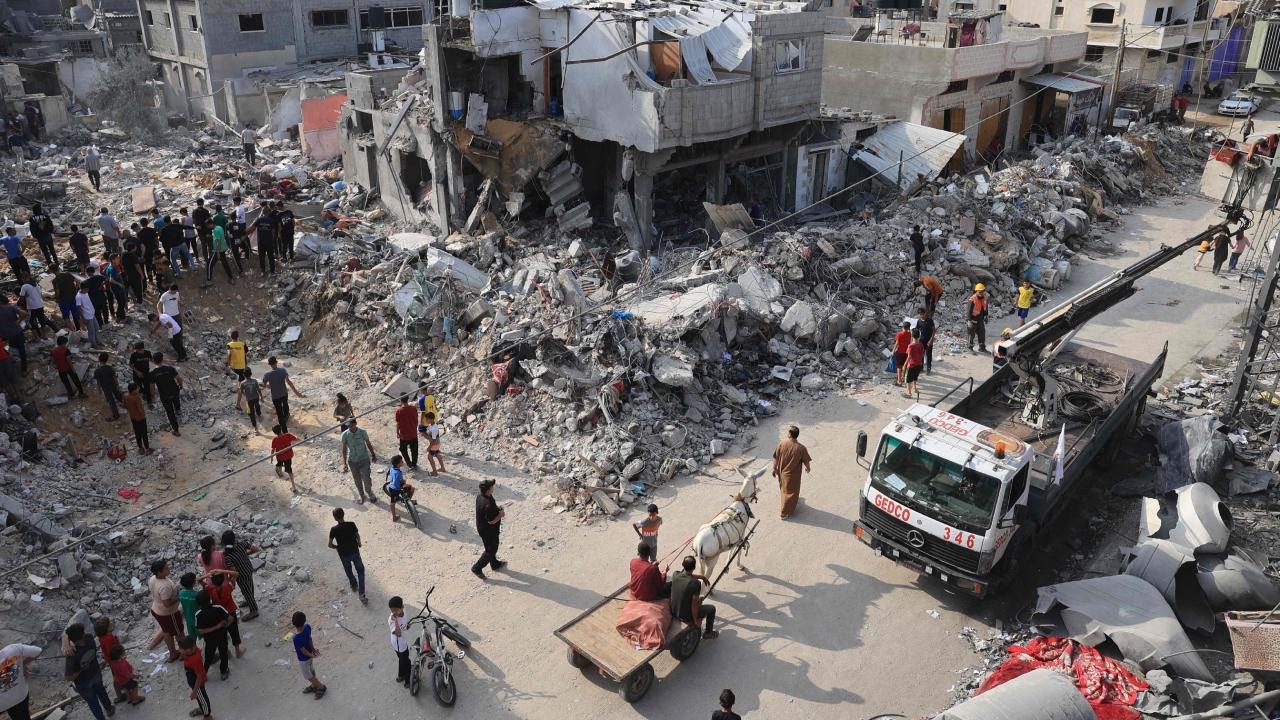 Israeli Prime Minister Benjamin Netanyahu and opposition leaders Yair Lapid and Benny Gantz spoke on Saturday and discussed the possibility of joining Netanyahu's government because of the emergency created by Saturday's infiltration and rocket attacks from Gaza, Ha'aretz newspaper reported