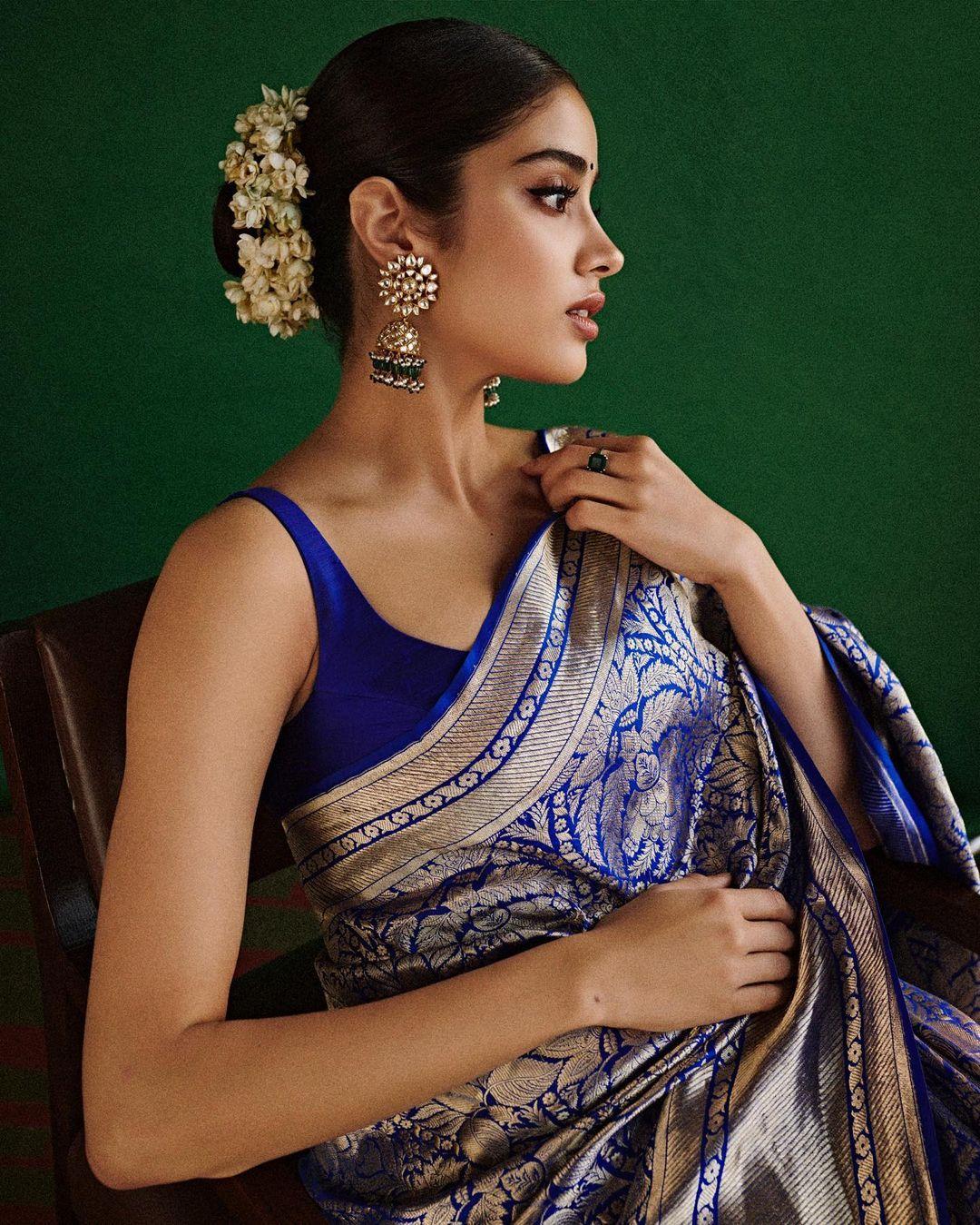 With winged eyeliner, subtle eye shadow, and a nude lip to complete her makeup, Janhvi Kapoor embodies the essence of Navami fashion sophistication.