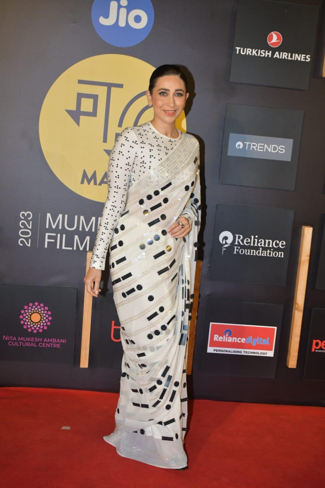 Karisma Kapoor showed up in a beautiful white saree to support the screening of her sister Kareena Kapoor's movie, 'The Buckingham Murders'