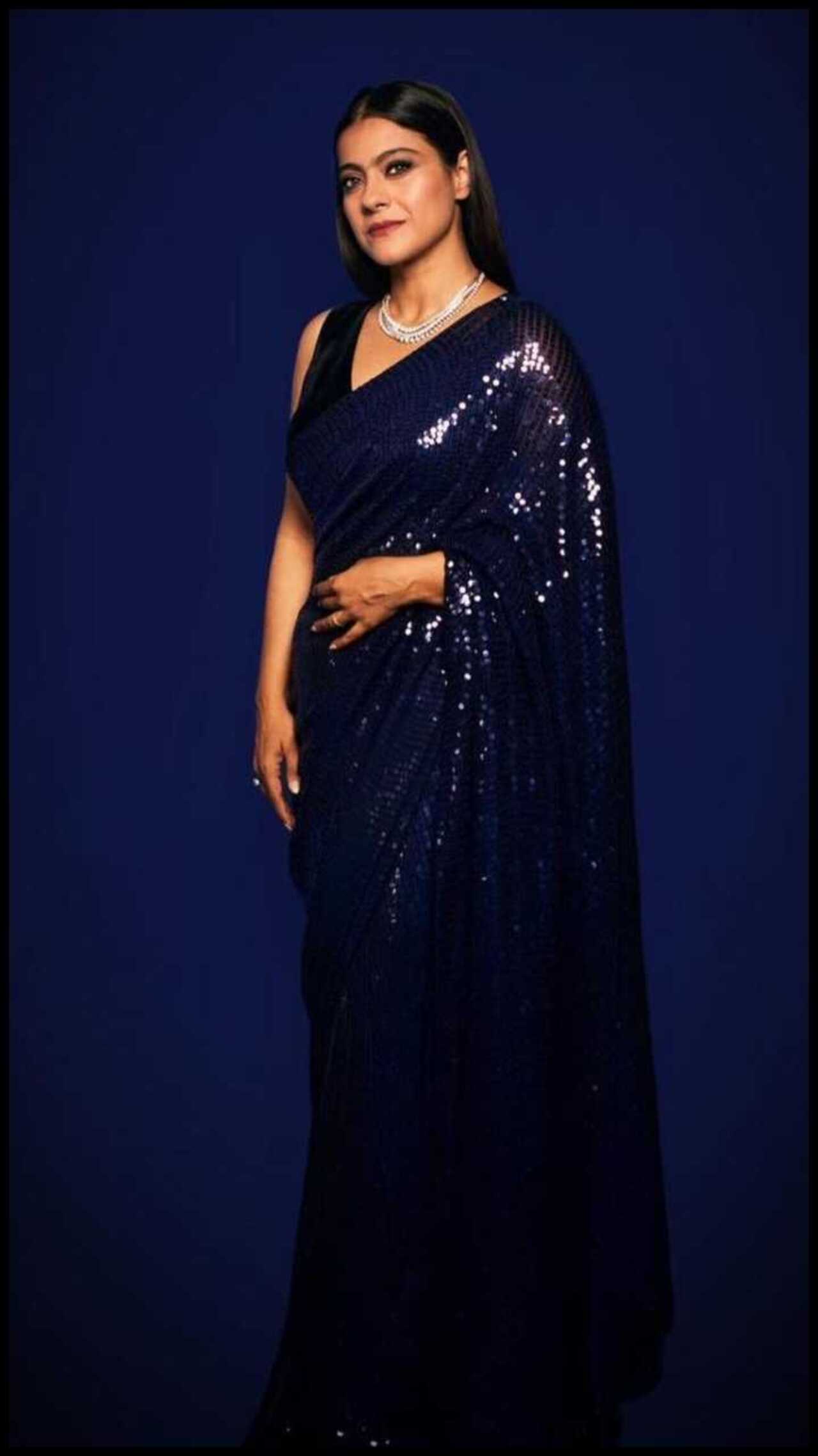 Kajol's sequined deep blue saree is perfect if you are going for a royal vibe