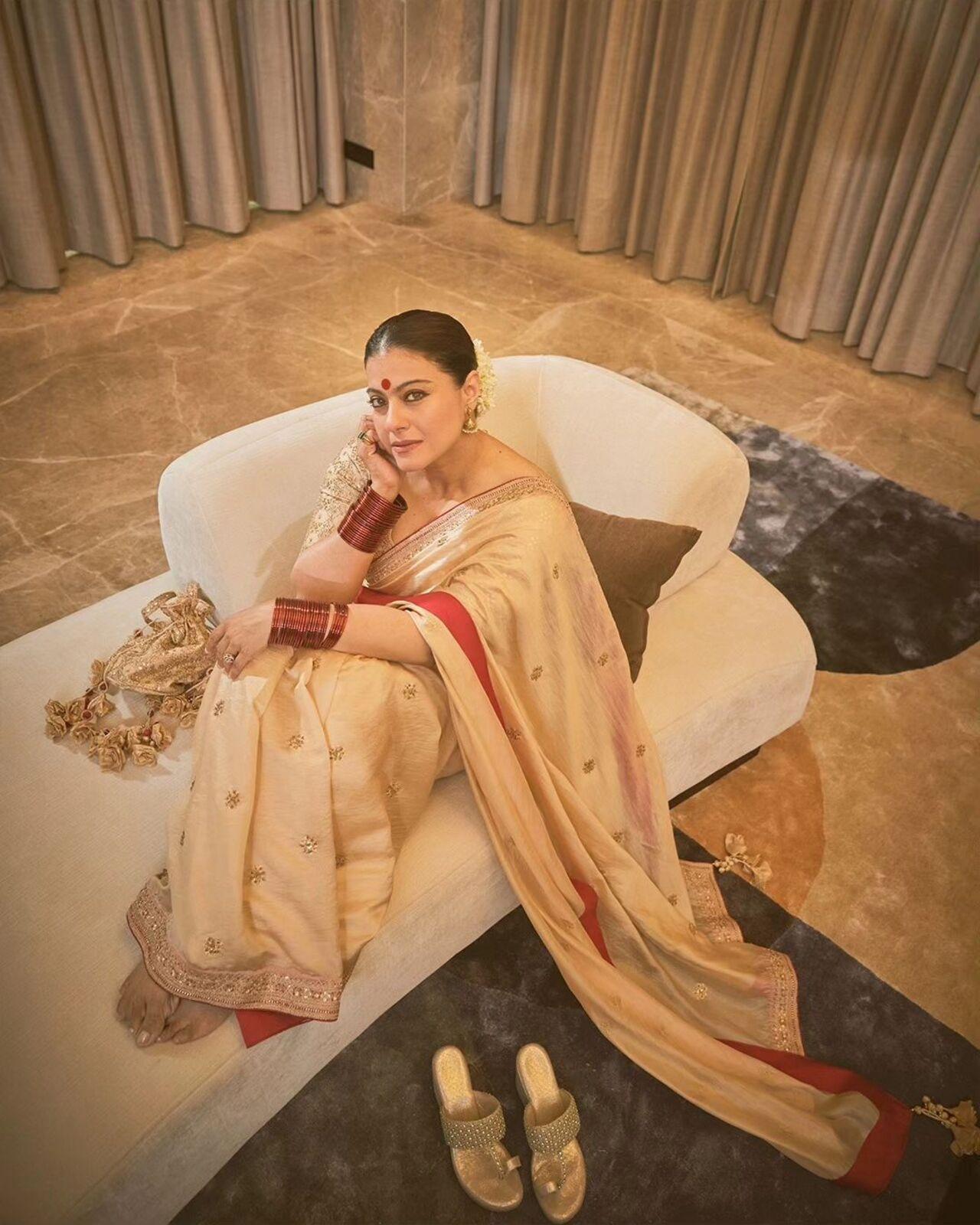 The 'My Name Is Khan' actress took to her social media handle to share inside pictures from Navami celebrations. For the occasion, Kajol opted for a golden saree paired with a big bindi and traditional jewellery