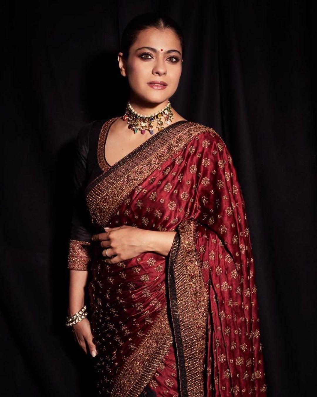 She wore a stunning maroon and grey saree designed by Ritu Kumar