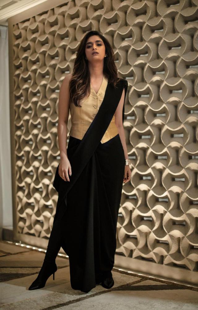 Want to shake up the saree look with something formal? Ditch the traditional blouse for a contrasting waistcoat