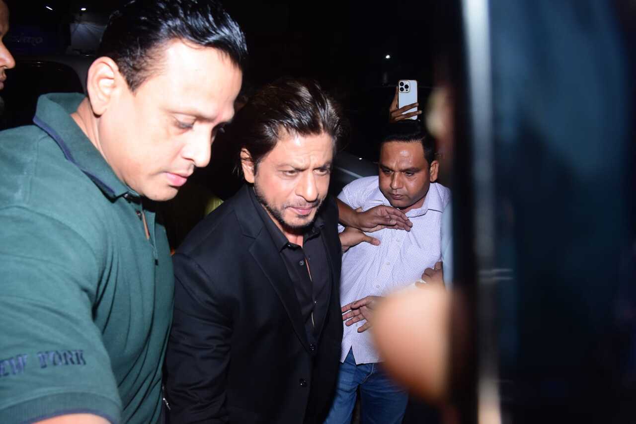 Shah Rukh Khan arrived in his standard black suit. The actor who has been provided with Y-level security was surrounded by guards as he headed inside