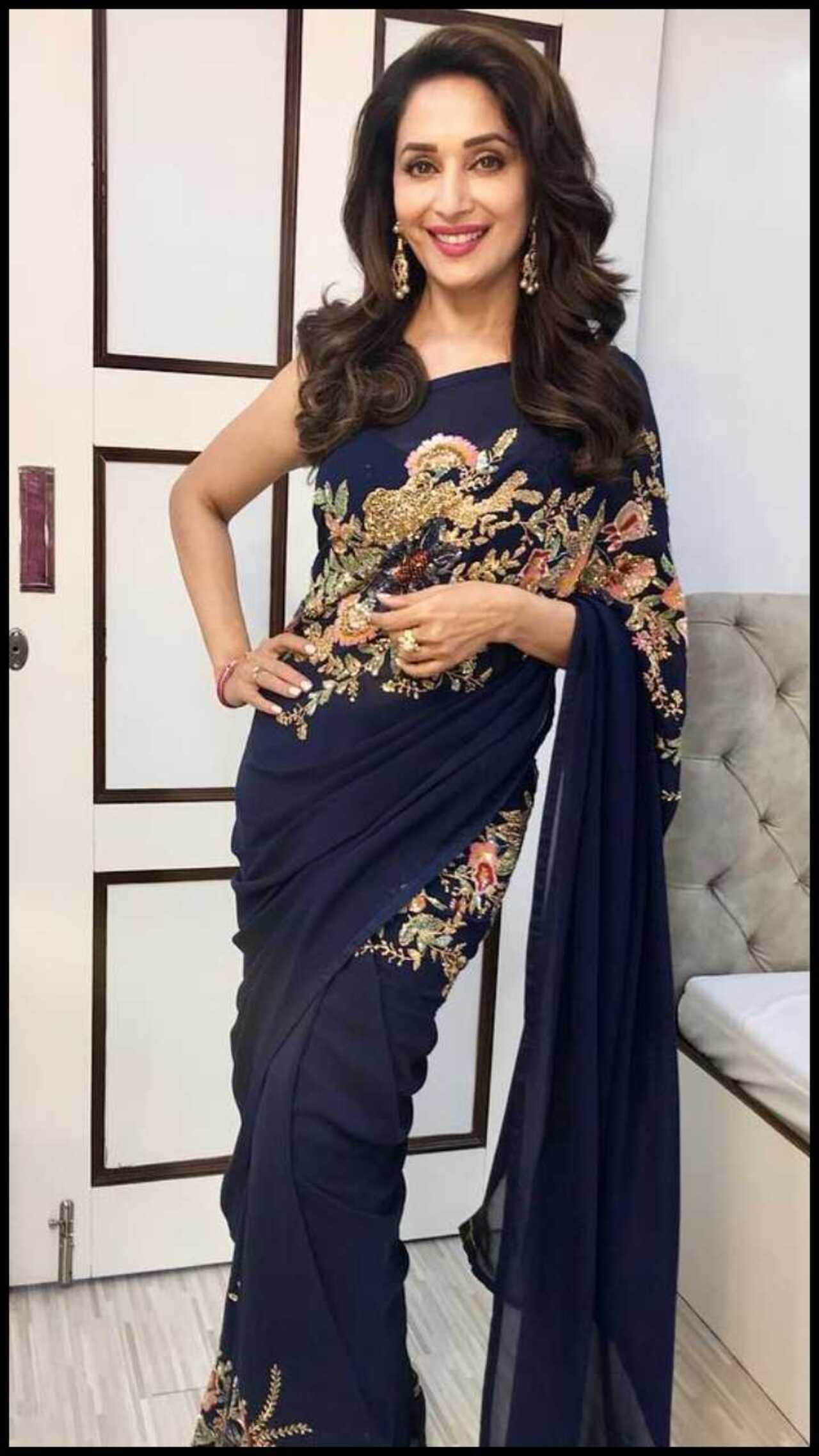 Madhuri Dixit's blue saree with golden embroidery is perfect for the festive season