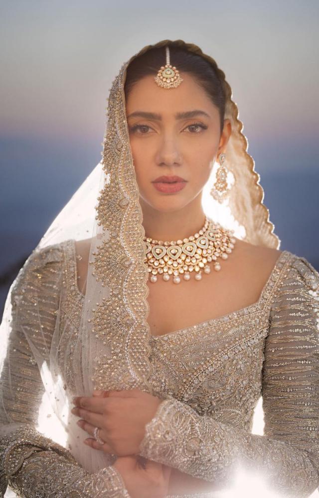 Mahira Khan recently shared some stunning wedding photos that showcase her in a beautiful ice blue lehenga custom-designed by Faraz Manan.
