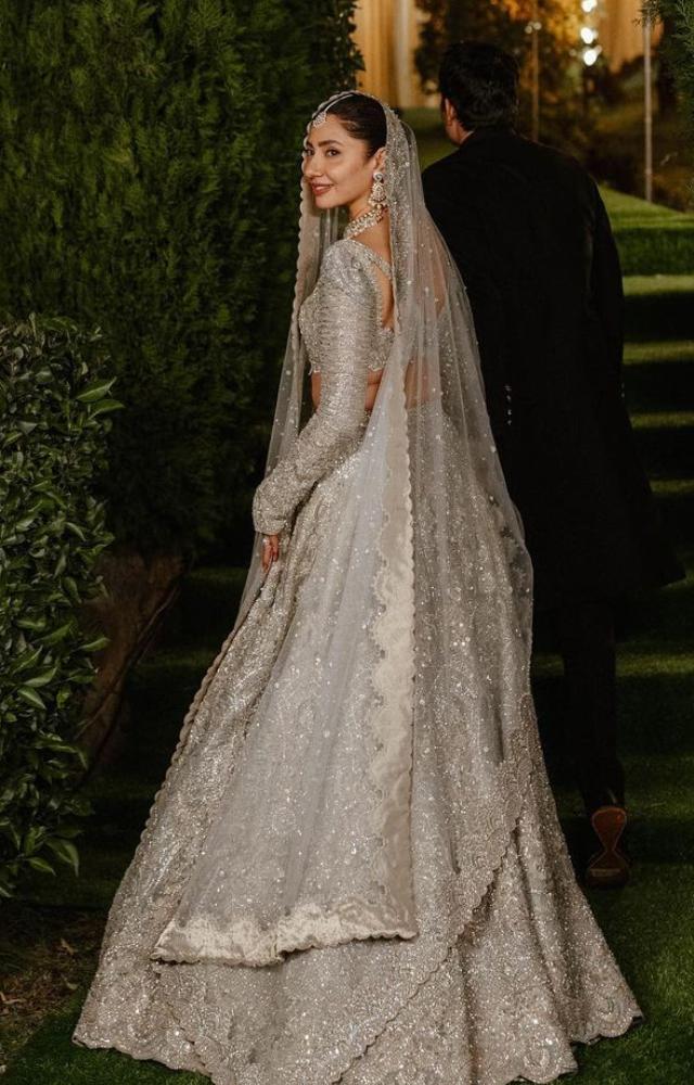 The actress, accompanied by her 14-year-old son Azlan, radiates as a new bride.