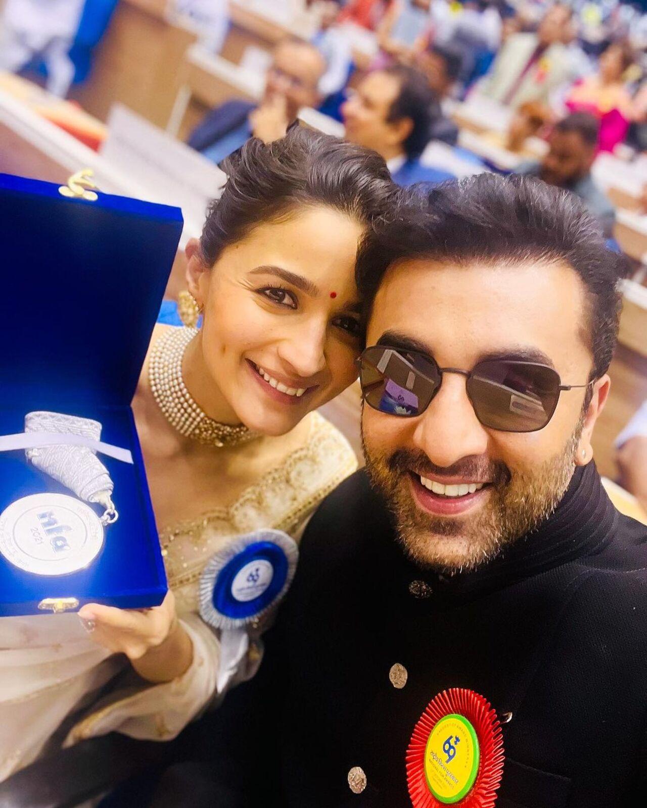 Alia Bhatt posed with her husband Ranbir Kapoor while holding her National Award certificate