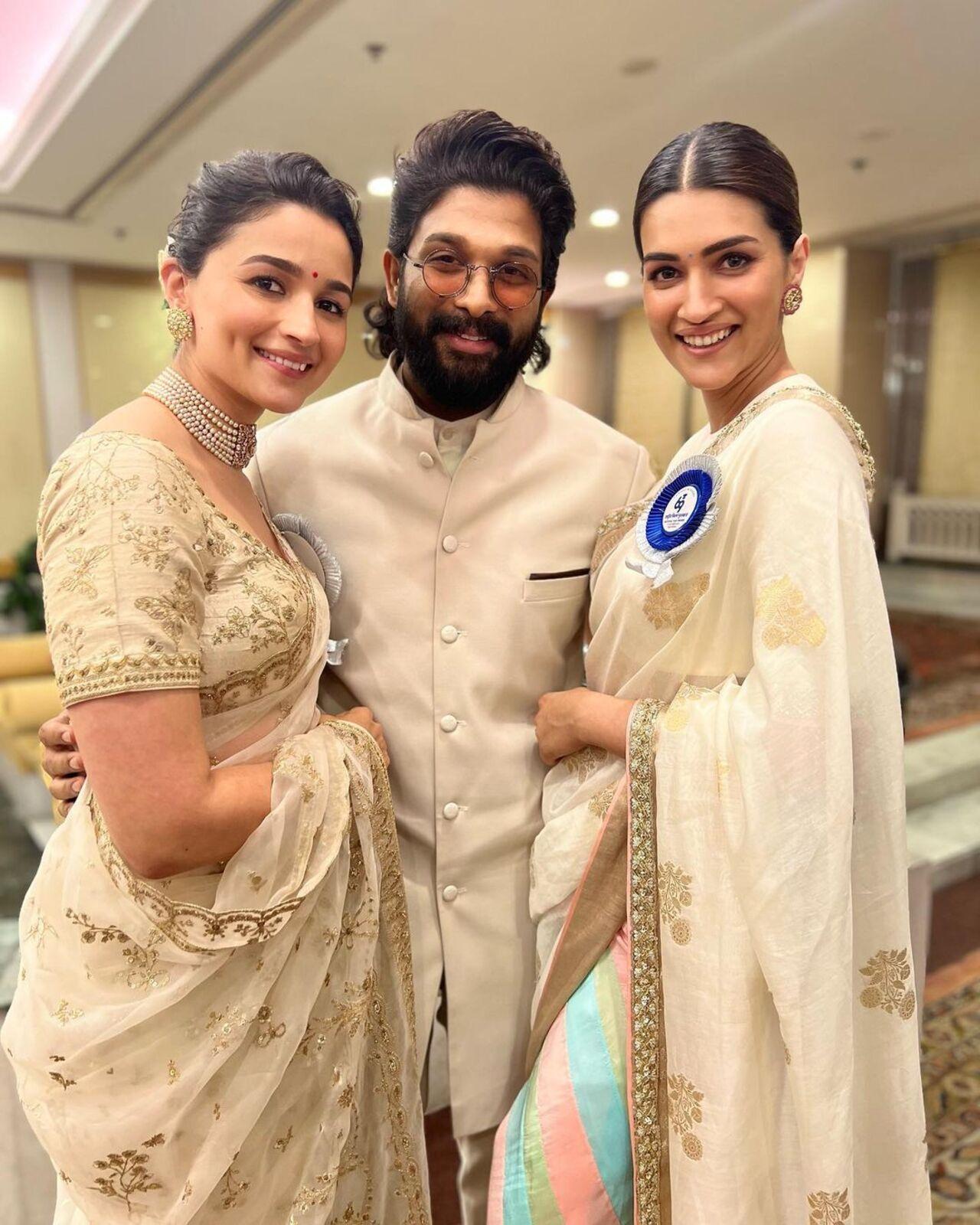 Best Actors- Alia Bhatt, Kriti Sanon and Allu Arjun twinned in shades of ivory at the National Award ceremony in Delhi. They posed for a pretty picture