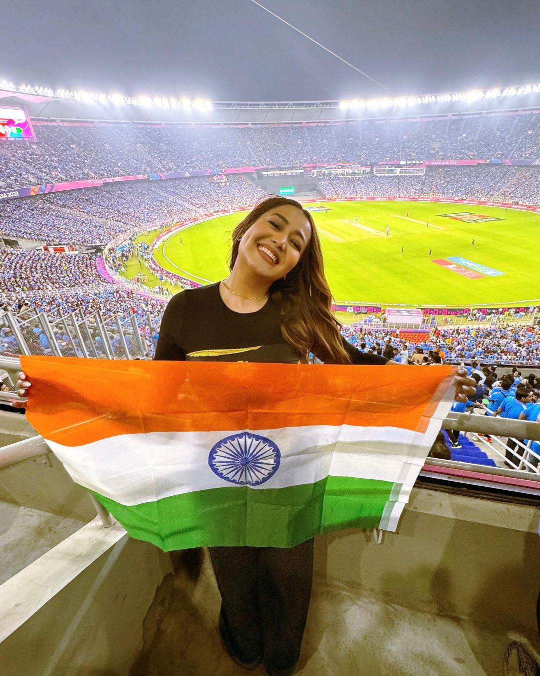 He joined the match with her husband and, after India's victory, won over fans by signing autographs graciously. Neha's style was on point as she sported a black top with a trendy scarf and black pants. 