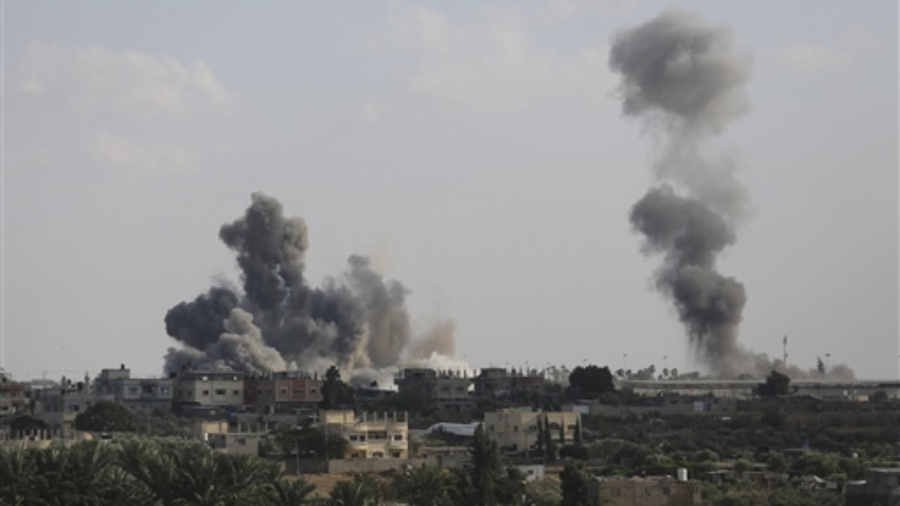 Smoke rises from an explosion caused by Israeli airstrikes on the border between Egypt and Rafah, Gaza Strip (Pic/PTI)