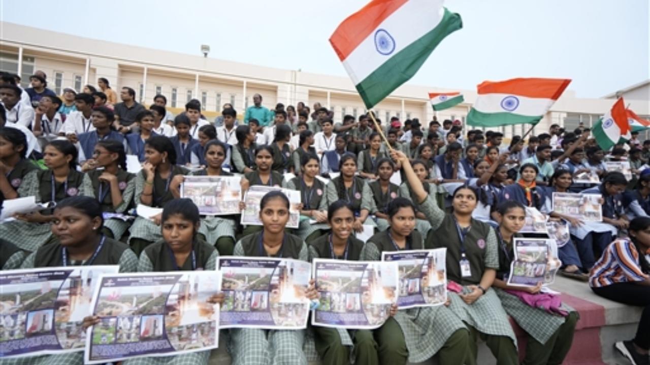 Students gather for the launch of ISRO's TV-D1 test flight of Mission Gaganyaan, at Satish Dhawan Space Station, in Sriharikota, Saturday, Oct. 21, 2023