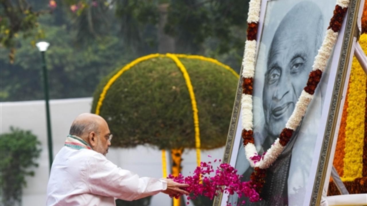 Union Home Minister Amit Shah pays homage to Sardar Vallabhbhai Patel on his birth anniversary, at Patel Chowk in New Delhi