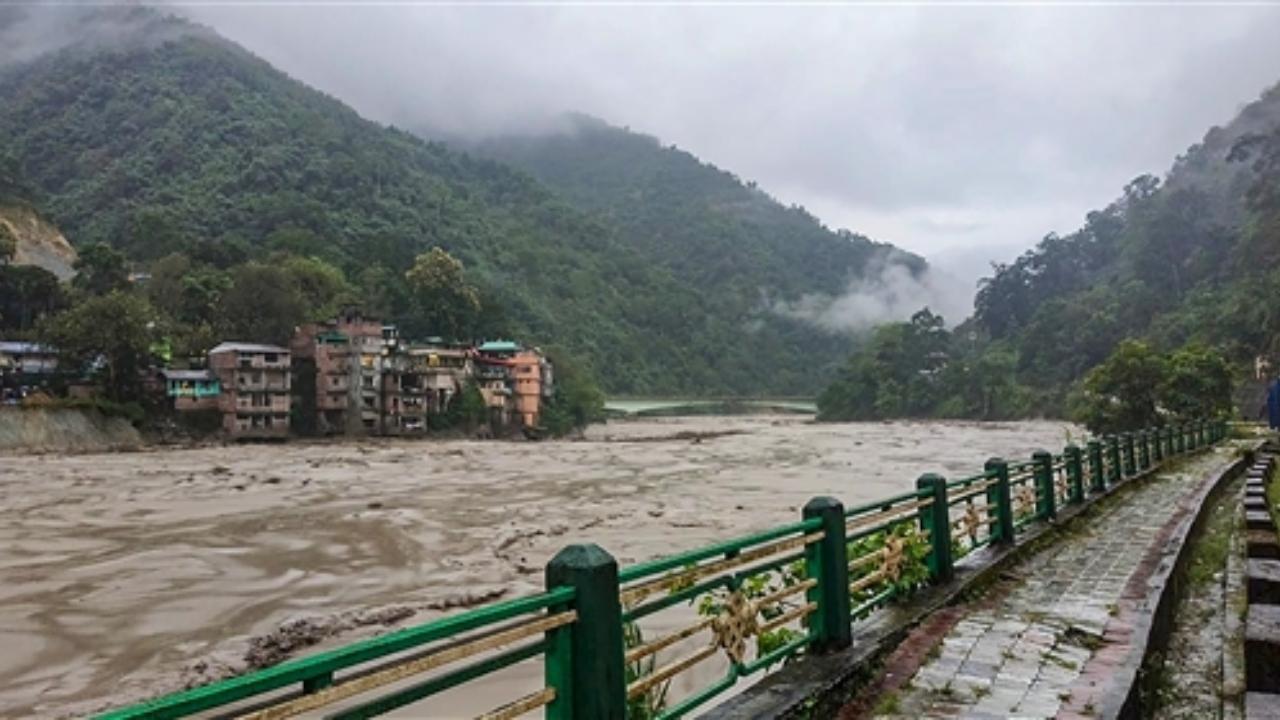 The Gangtok District Administration confirmed the destruction of the Indreni Bridge in Singtam town, situated about 30 kilometers from Gangtok. Another connecting bridge in Balutar hamlet was also carried away in the deluge around 4 am
