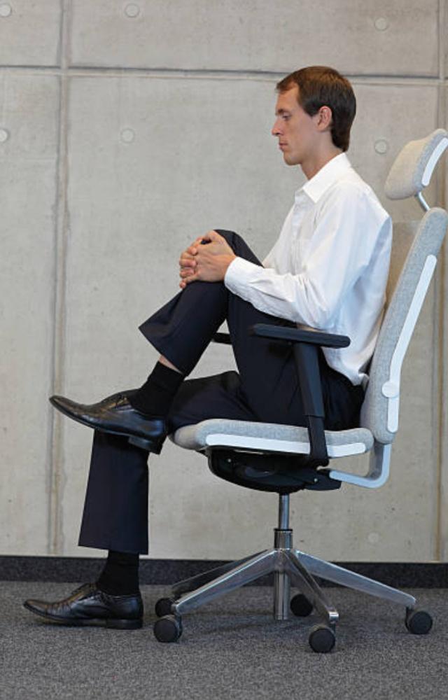 Lift one leg straight while seated, hold for five seconds, and repeat 10 times per leg. This will help engage core and leg muscles

