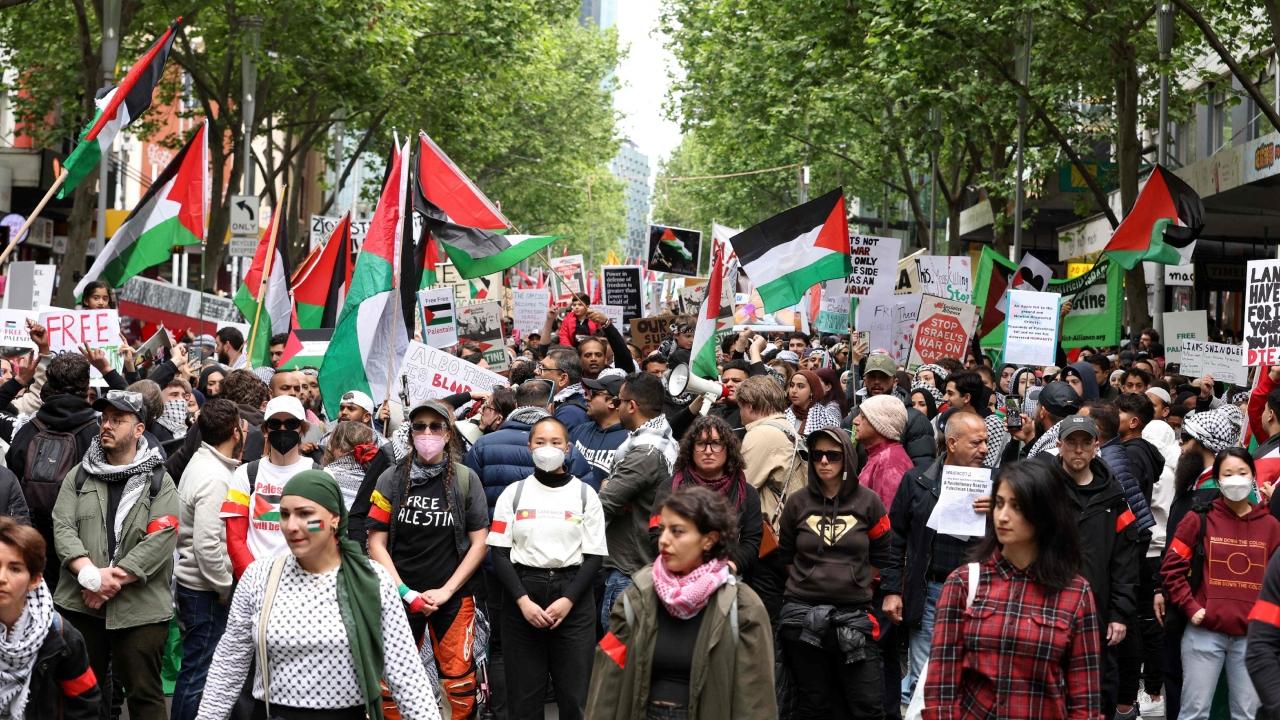 Waving Palestinian flags, the rally also marked a major showing for the banned Islamist movement Al Adl Wa Ihssane (AP)