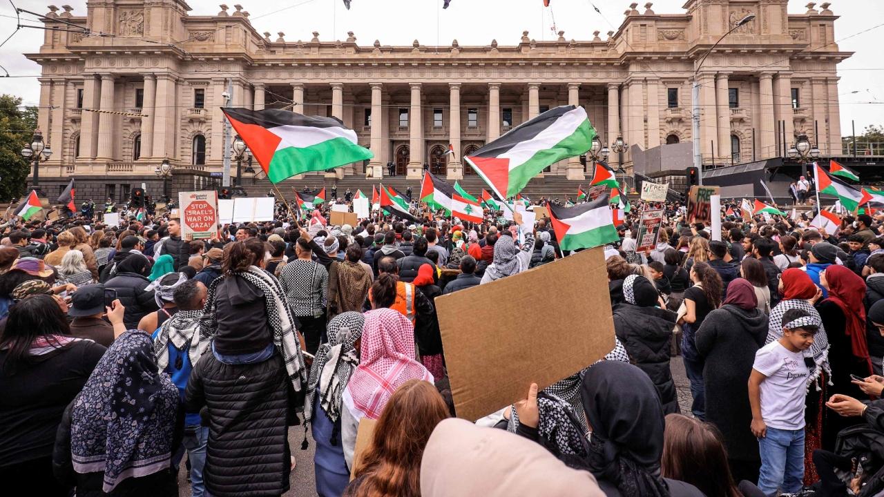 Demonstrators marched in central Rabat and threw smoke bombs and fireworks as riot police stood between them and the Parliament building and other landmarks (AP)