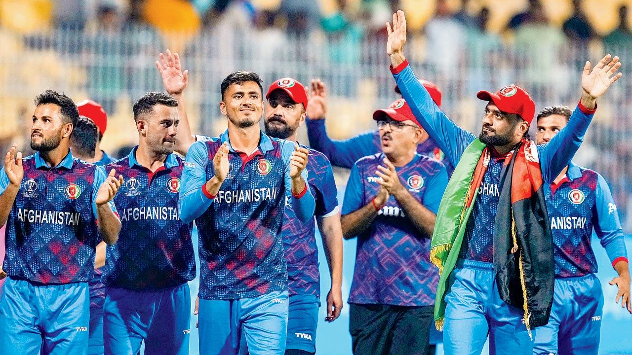 Afghanistan players acknowledge the crowd after their eight-wicket victory over Pakistan at Chennai on Monday. Pic/PTI