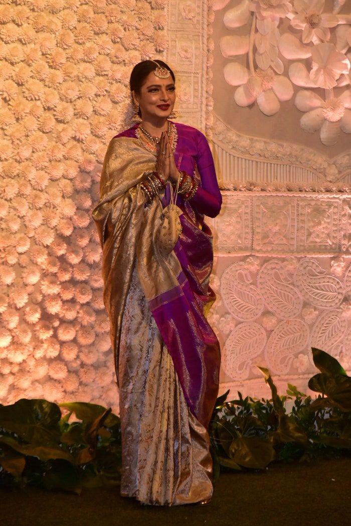  Rekha stepped into the limelight looking absolutely stunning in a gold and purple saree 