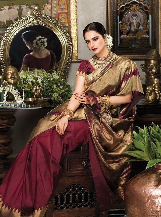 Bollywood's timeless fashion icon, Rekha, is known for her unmatched elegance. Whether she's showcasing her distinctive style in stunning Kanjeevaram sarees or silk attire, Rekha effortlessly embodies sophistication in every look she dons.