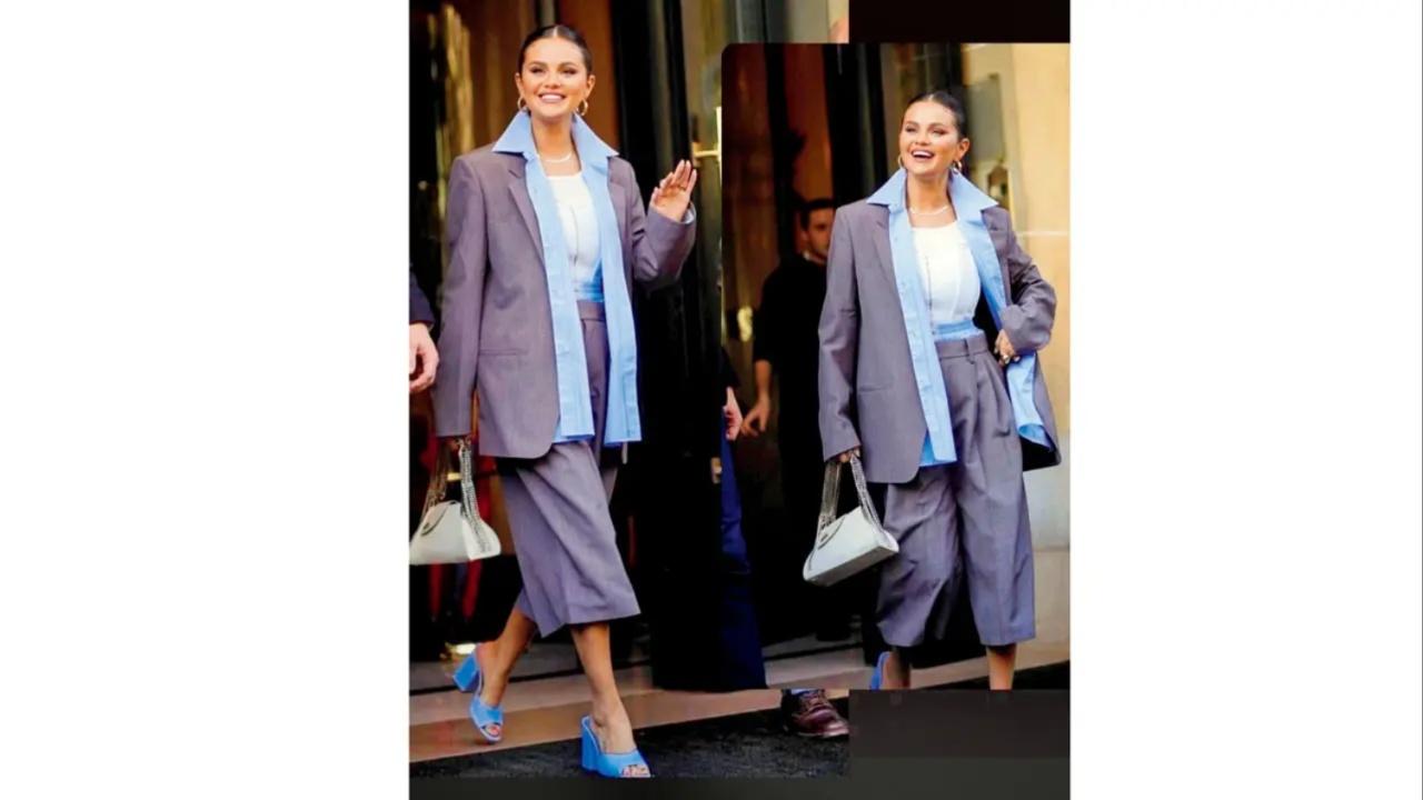 Dressed in what fashion experts are calling the French entrepreneur or French business outfit, Gomez looked chic as ever in a grey blazer with matching tailored culottes, a powder blue open shirt over a white corset and boxer shorts with the waistband showing