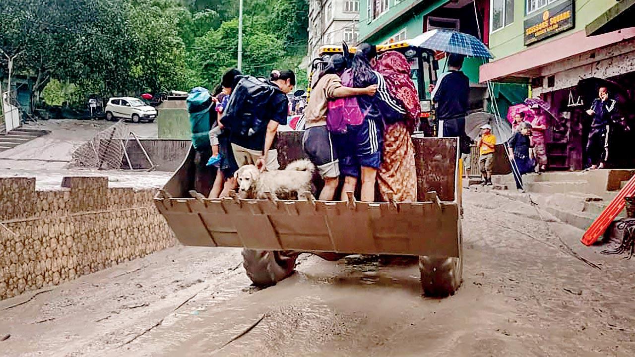 A flooded locality at Muguthang in north Sikkim. Pics/PTI 