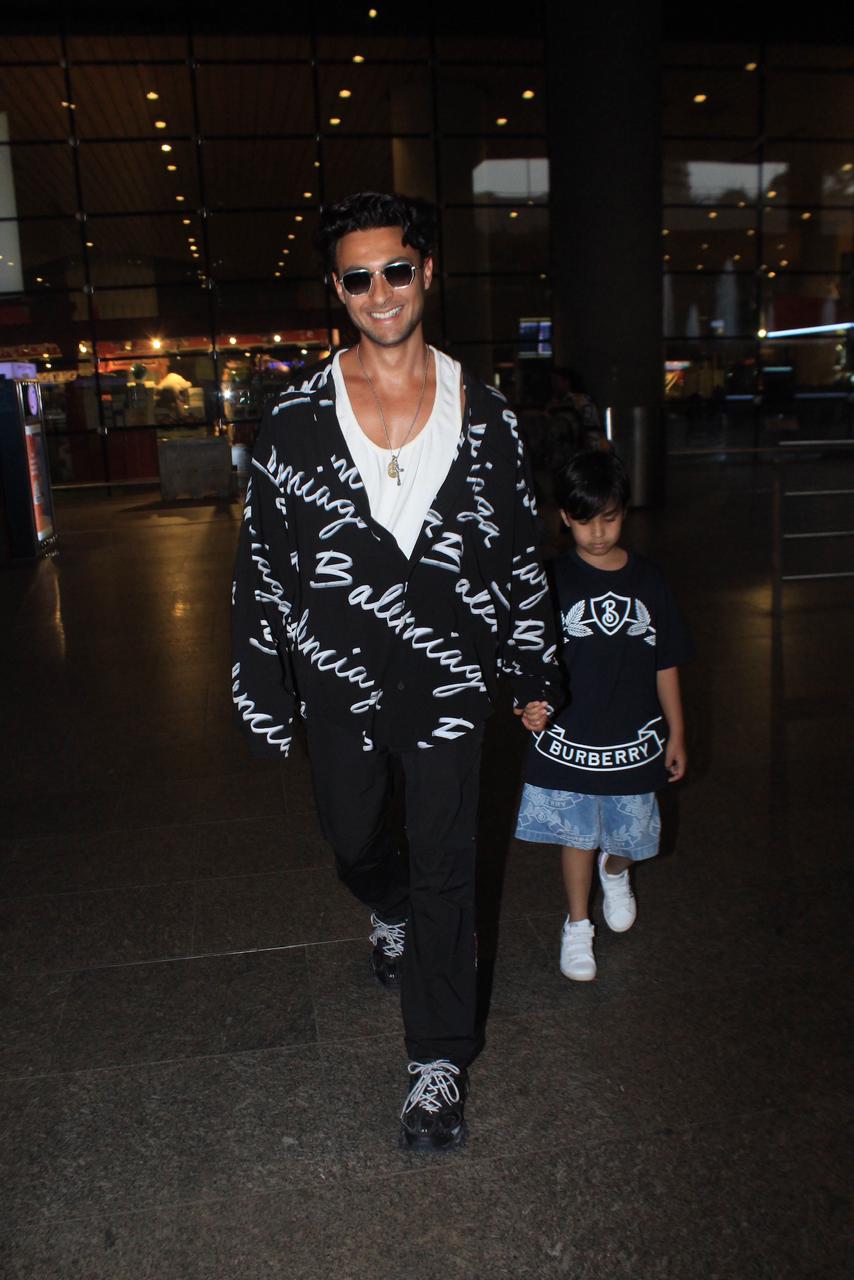Aayush Sharma was seen alongside his children at the airport today