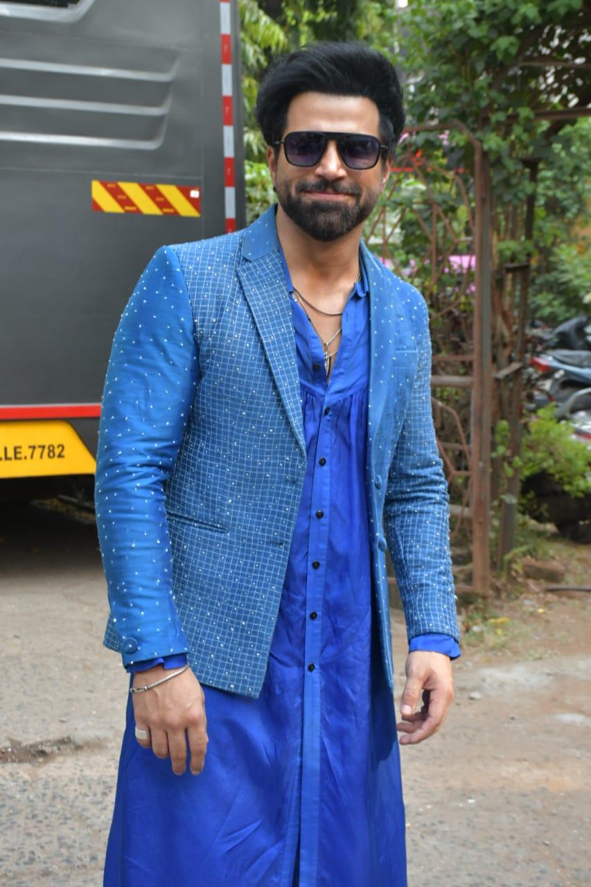 Rithvik Dhanjani looked handsome as he wore a blue kurta paired with a matching shimmery jacket 