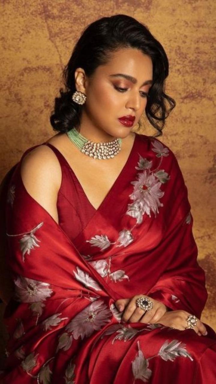 Swara Bhaskar was a vision to behold in this deep-hued red floral print saree. She paired it with a choker and opted for bold retro-style glam