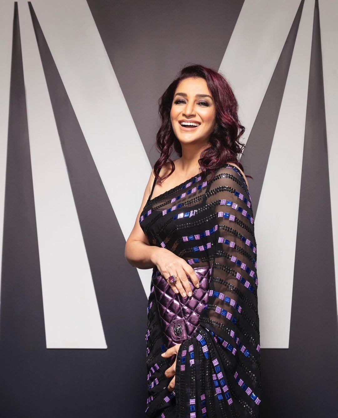 Tisca Chopra wore a beautiful black saree designed by Manish Malhotra.