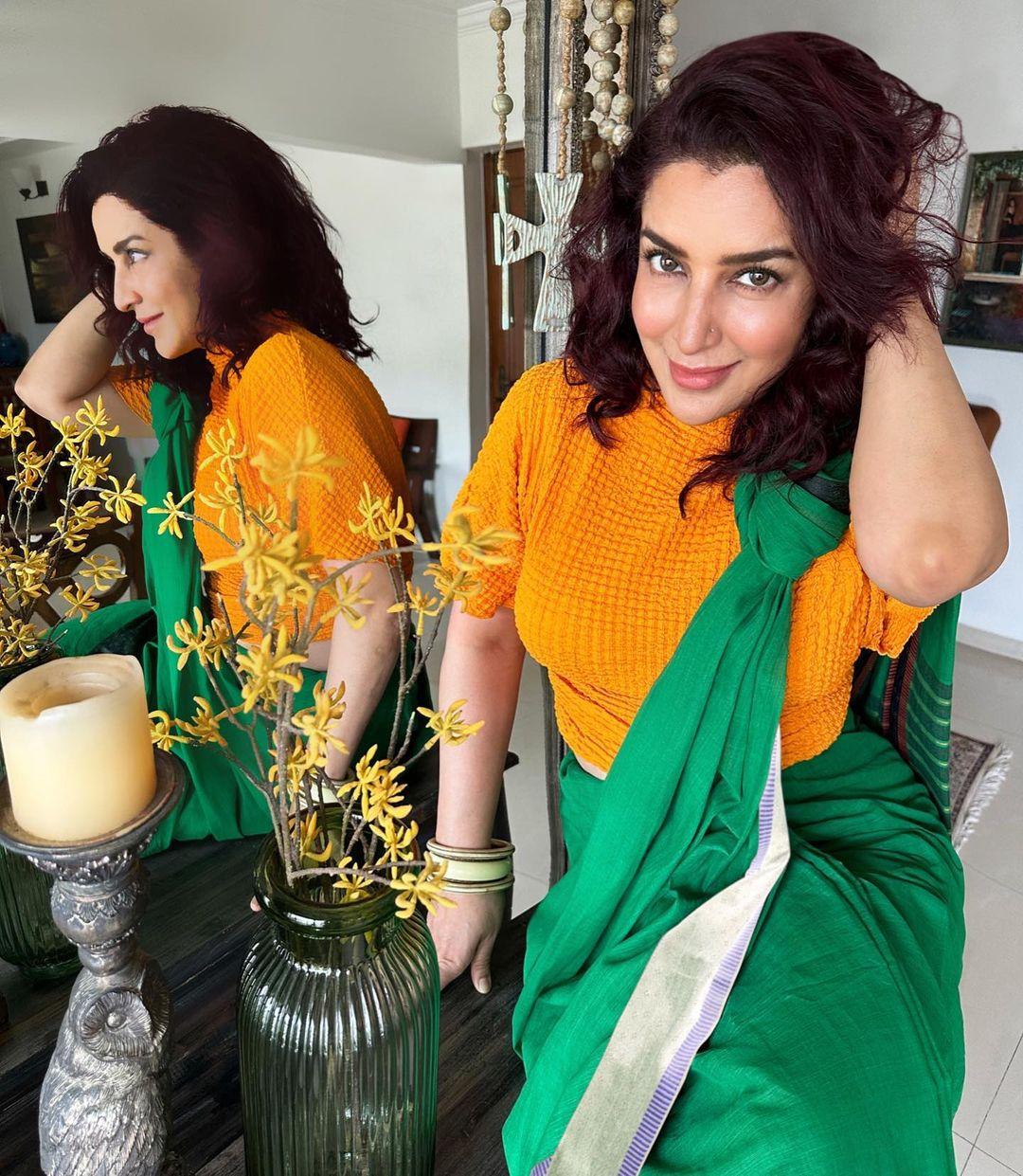 Tisca Chopra looked fabulous in a green saree, but what set her look apart was the modern draping style she chose, breaking away from tradition. She teamed it with a vibrant orange blouse featuring stylish half sleeves.