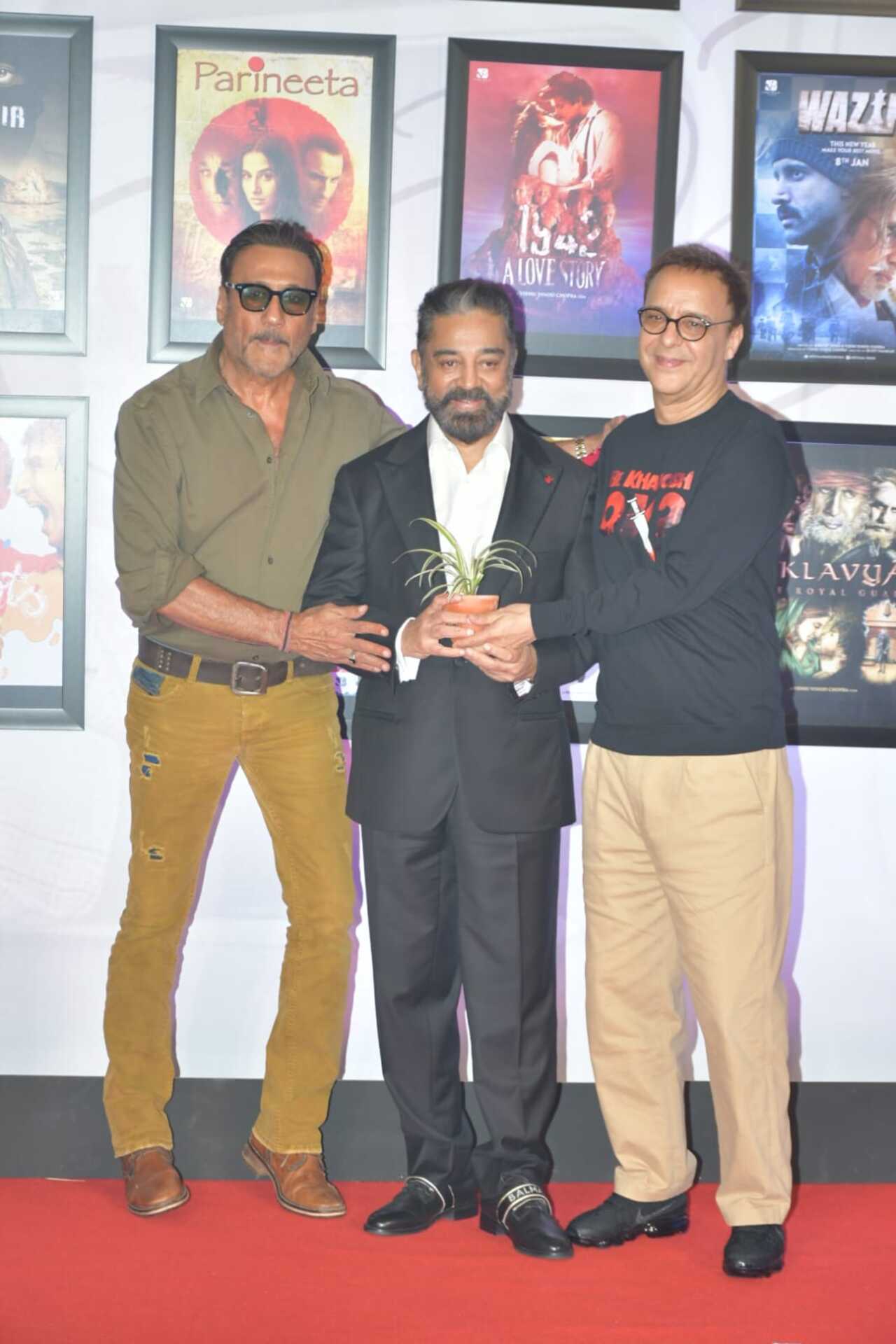 Jackie Shroff who is known to attend every function with a potted plant gifted one to Kamal Haasan