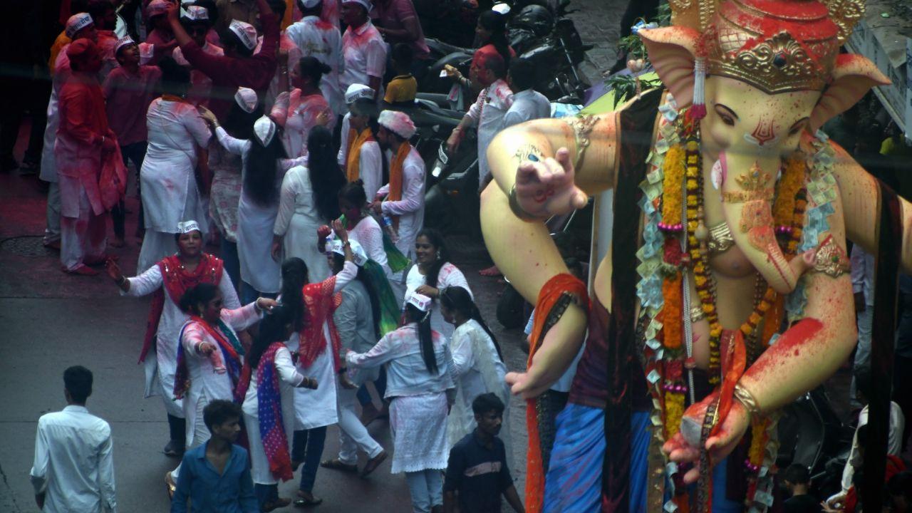 Crowds also assembled on main road leading to South Mumbai’s Girgaon which sees maximum number of procession pass