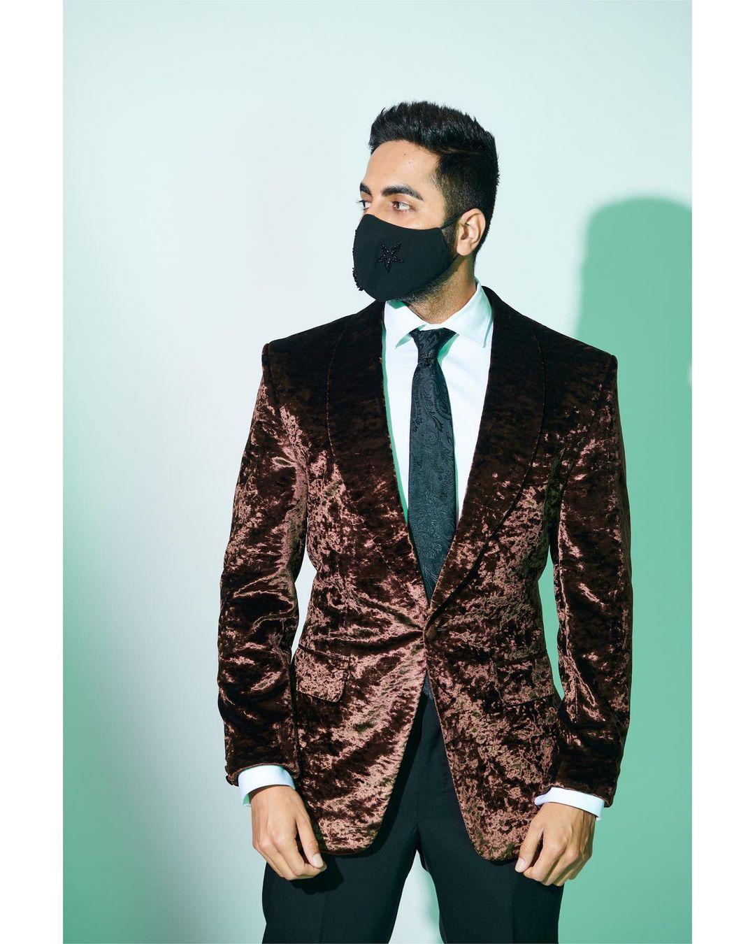 To add a touch of luxury to his style, Ayushmann chose a brown suede suit that oozed elegance and refinement.