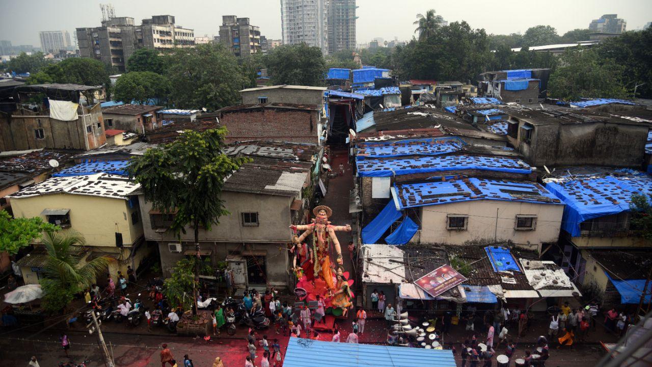 Some elders even carried their children on their shoulders so they could witness Bappa’s visarjan