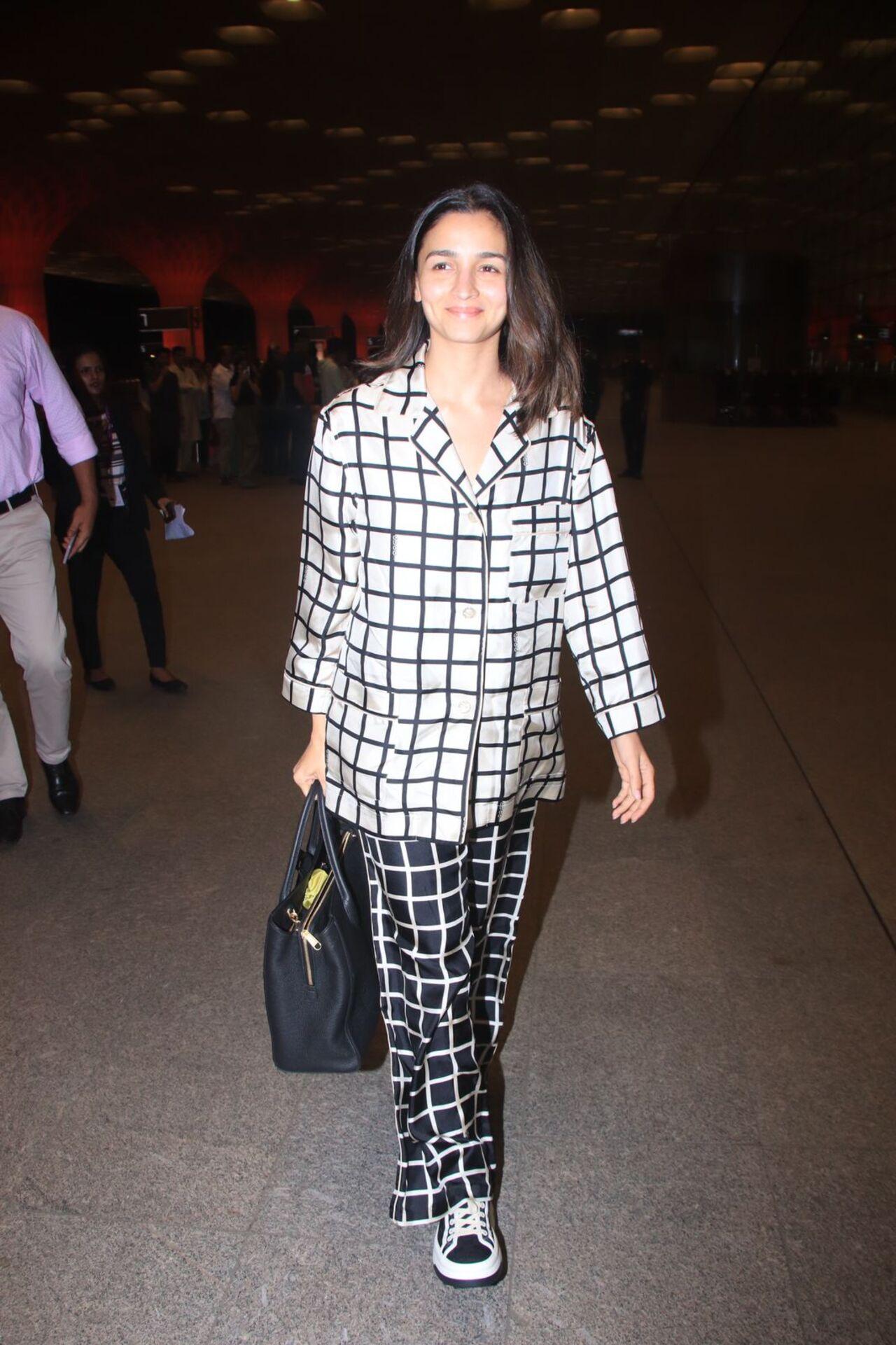 Alia Bhatt opted for a stylish black and white outfit as she was clicked at the airport