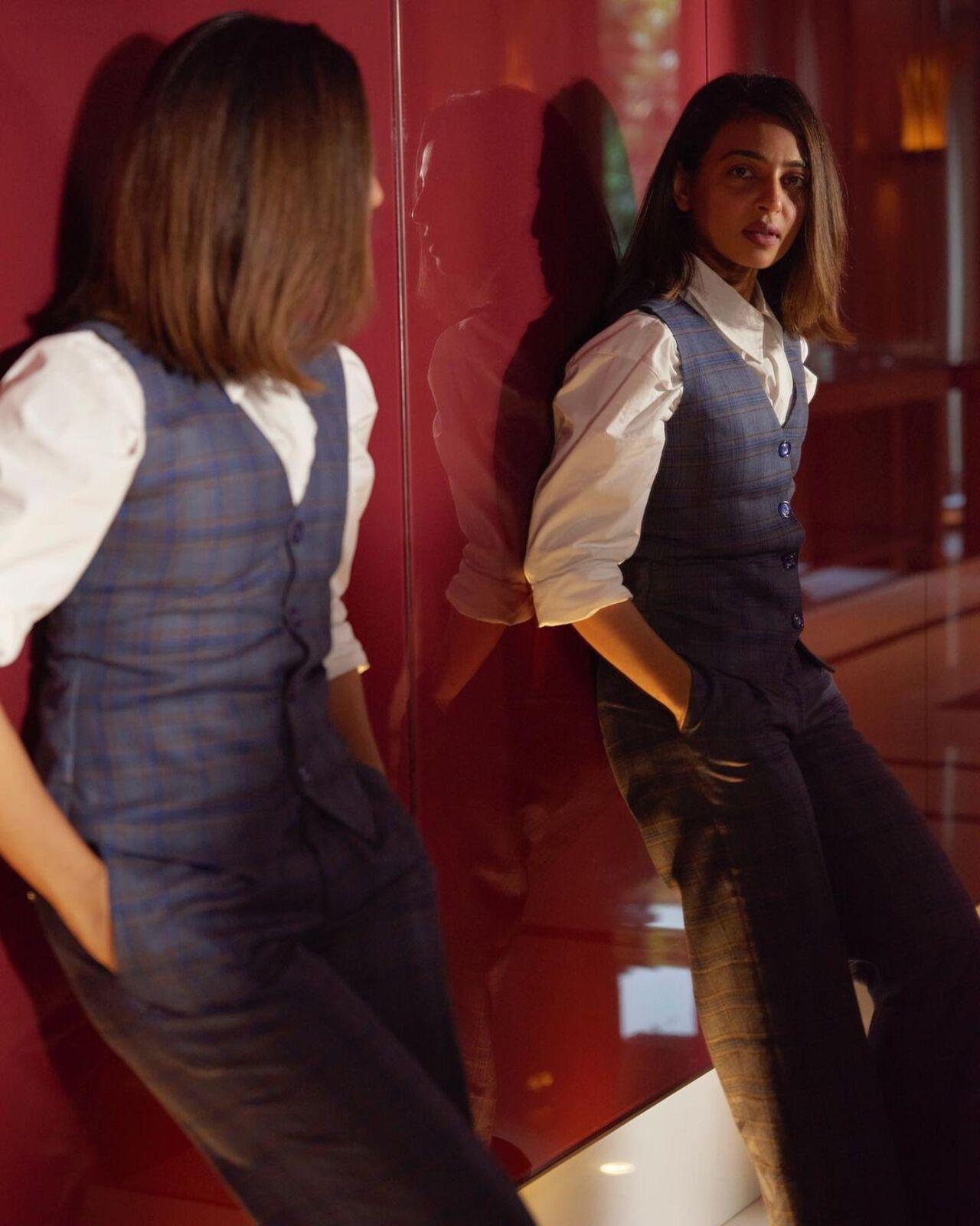 Radhika Apte's fashion choices are always on point, and her recent outfit is no exception. For this look, she chose to wear a checkered waistcoat paired with matching pants and a crisp white shirt. 