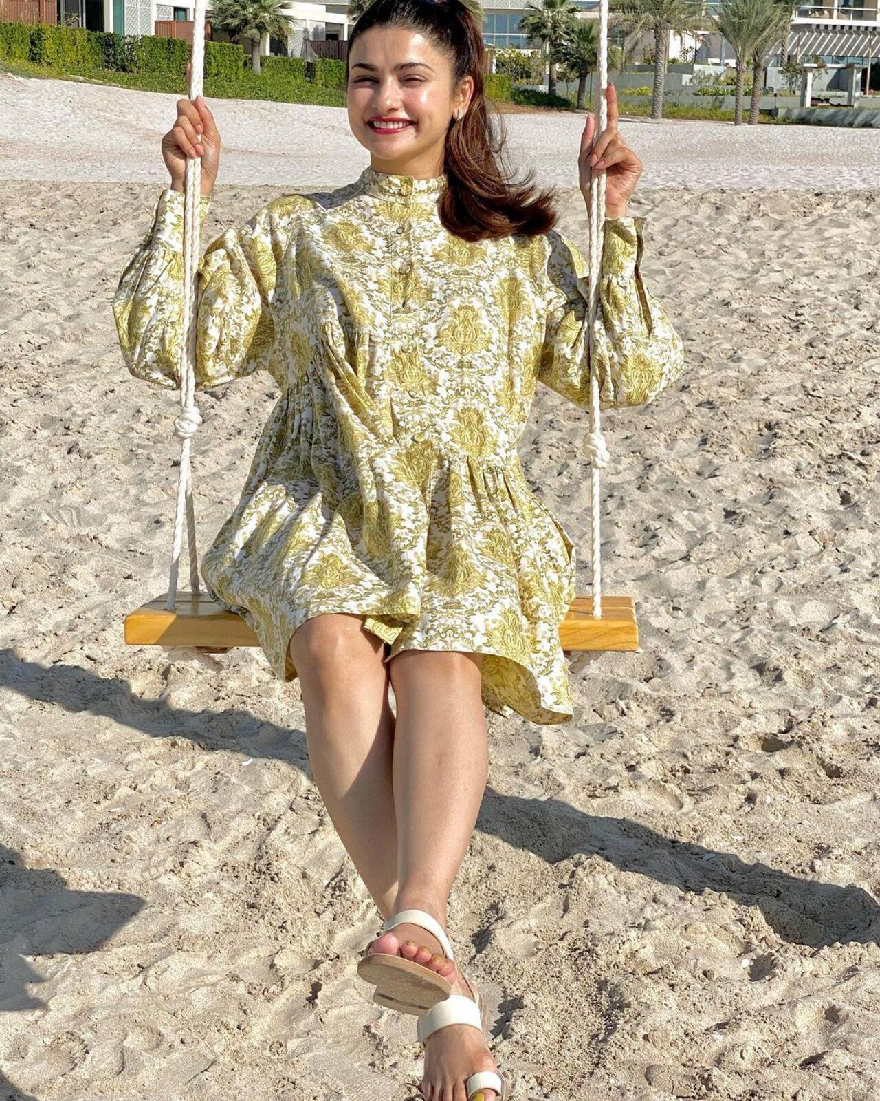 She opted for a beautiful printed pastel dress. The actress tied her hair in a chic ponytail