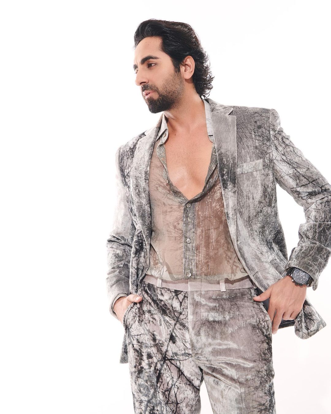 Grey, often regarded as a subtle and understated color, found a whole new dimension when draped over Ayushmann's shoulders.