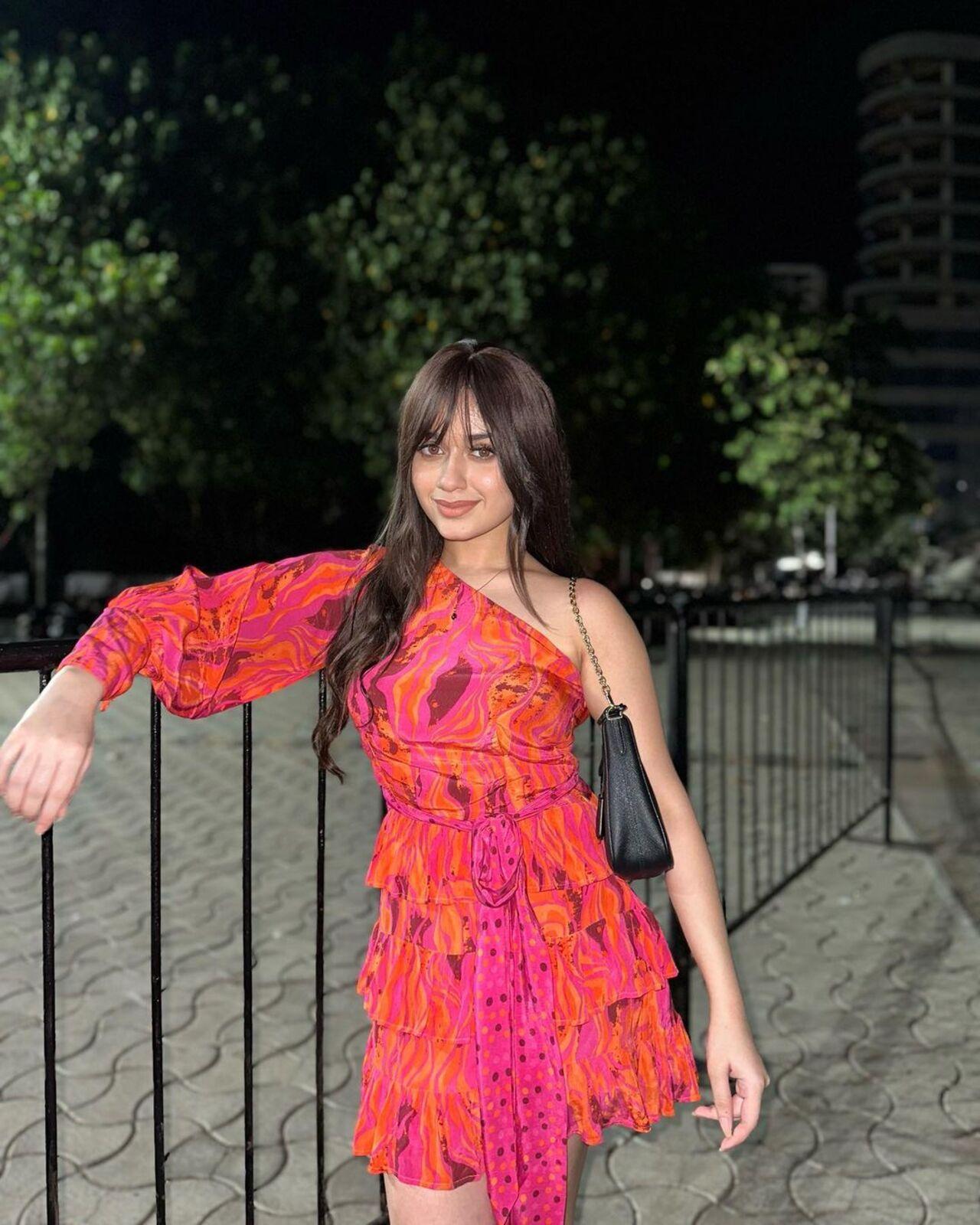 If you ever find yourself with party plans on the horizon, take a page out of Jannat Zubair's book. Opt for a pretty pink dress, let your hair flow, and don't forget those timeless bangs