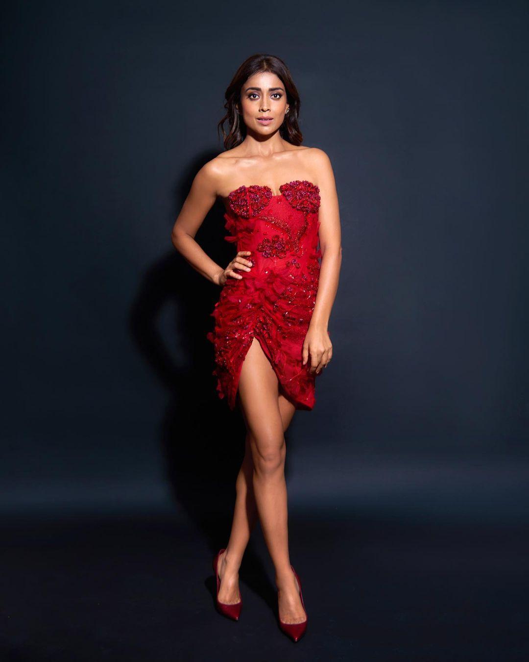 To complement her daring red hot dress, Shriya opted for a makeup look that emphasized her features without overwhelming her overall appearance.